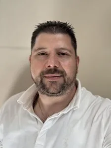 Man wearing white shirt looking at camera portrait