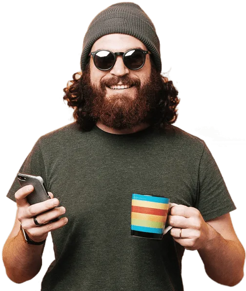 Bearded man wearing sunglasses holding phone and coffee mug